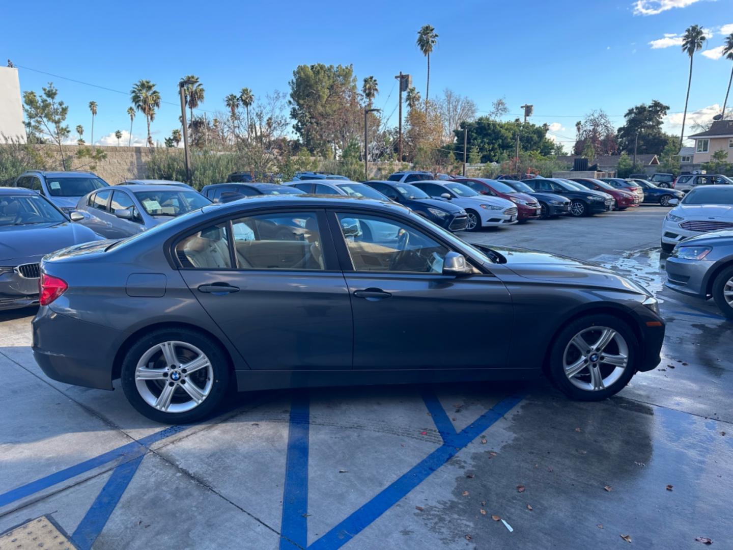 2013 Gray /Black BMW 3-Series (WBA3C1C56DF) with an 4 CYLINDER engine, Automatic transmission, located at 30 S. Berkeley Avenue, Pasadena, CA, 91107, (626) 248-7567, 34.145447, -118.109398 - Elevate Your Drive with the 2013 BMW 328i Sedan - A Gem with low Miles in Pasadena, CA Step into the world of luxury and performance with the 2013 BMW 328i Sedan, now available at our BHPH dealership in Pasadena, CA. With 86,665 miles on the odometer, this vehicle is a testament to BMW's enduring - Photo#5